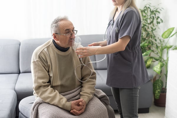 An example of an at-home clinical trial visit where a nurse monitors lung function